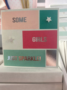 Some Girls star studs on a greetings card