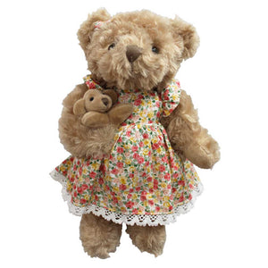 Teddy bear with floral dress and puppy